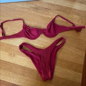 OneOne Swimsuit! Worn 1 time!  
Ribbed material and gorgeous magenta color!